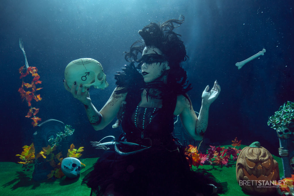 Underwater room or set showing a model posing for underwater photography