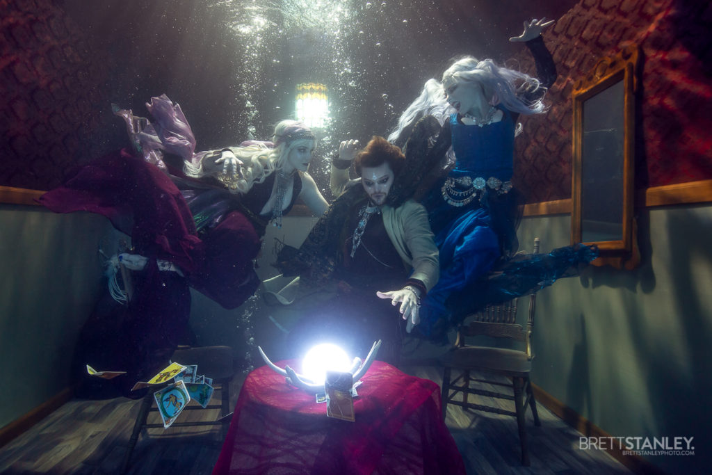 Underwater room or set showing a model posing for underwater photography