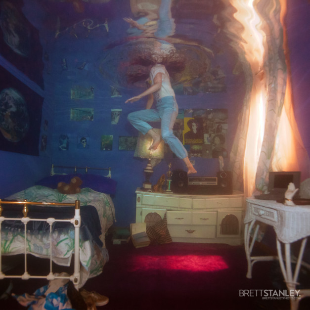 Underwater room or set showing a model posing for underwater photography
